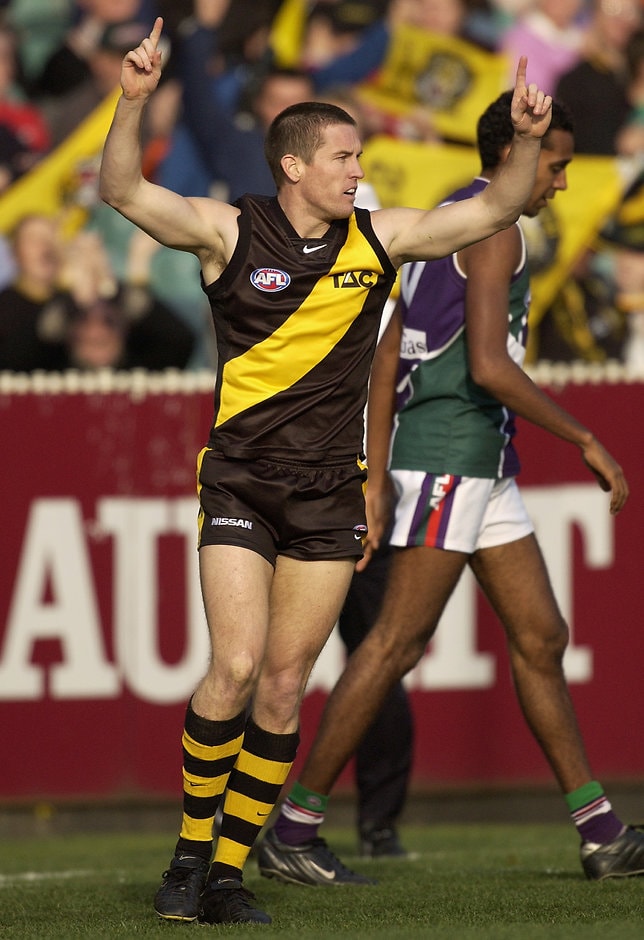 AFL 2002 Rd 19 - Richmond v Fremantle Matthew Rogers of the Tigers celebrates scoring a goal during the round 19 AFL match between the Richmond Tigers and the Fremantle Dockers at the Melbourne Cricket Ground in Melbourne, Australia on August 10, 2002.